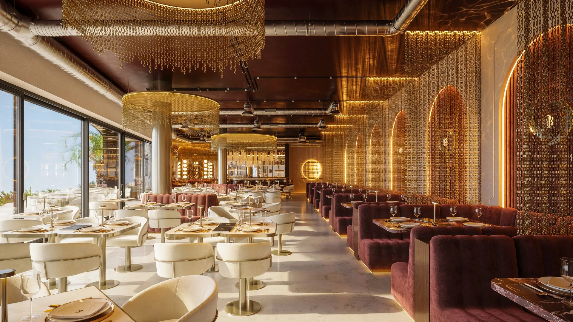 Restaurace HABIBI v AURO ve dne - sál se zlatými řetězovými lustry a vínovými lóžemi