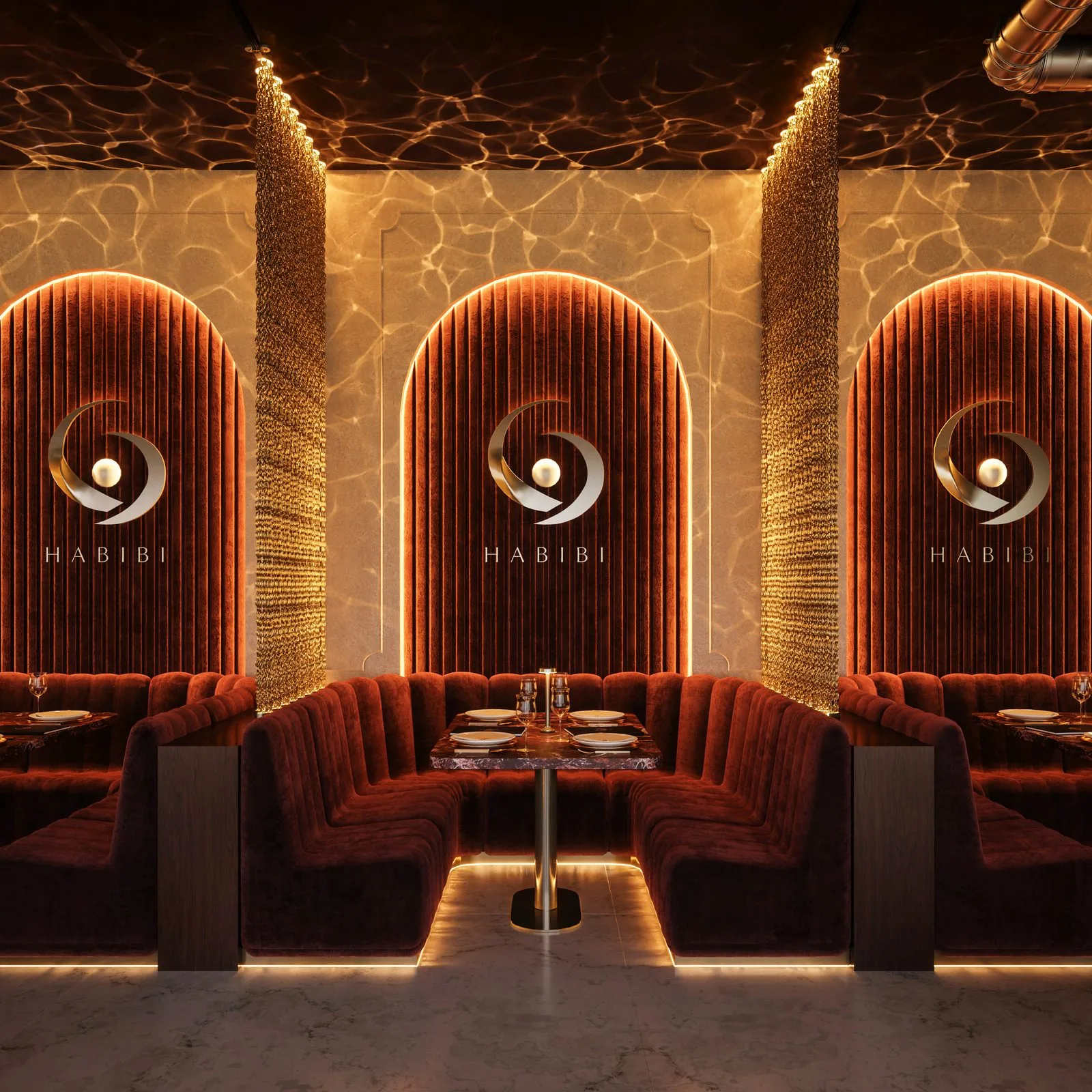 Lóže restaurace HABIBI - vínový samet v obloukových výklencích pod logem HABIBI